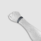 Bracelet in blue grey hatch grain leather on wrist