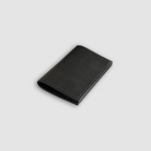 Card holder folded black Baranil leather lying
